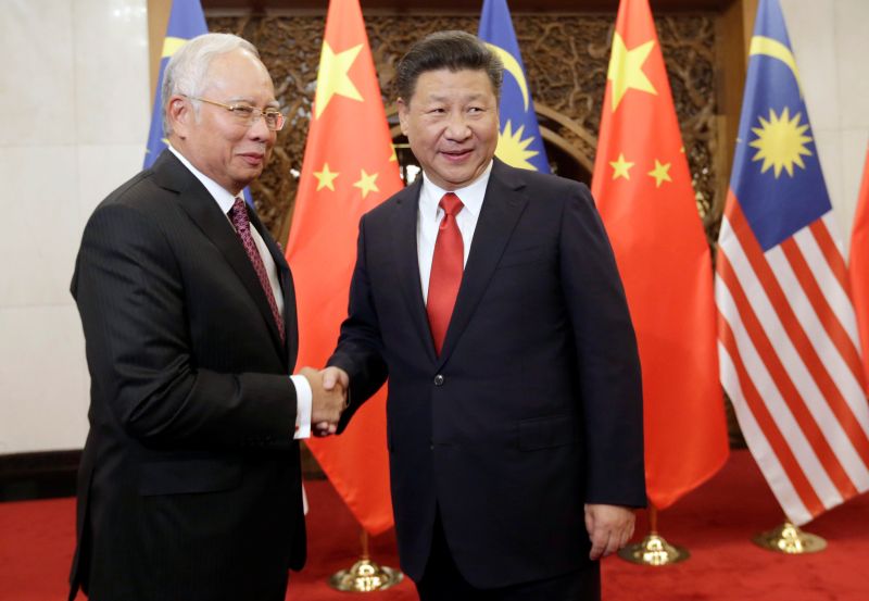 Prime Minister Datuk Seri Najib Razak (left) meets China's President Xi Jinping at Diaoyutai State Guesthouse, in Beijing. Picture released November 4, 2016. u00e2u20acu2022 Reuters pic