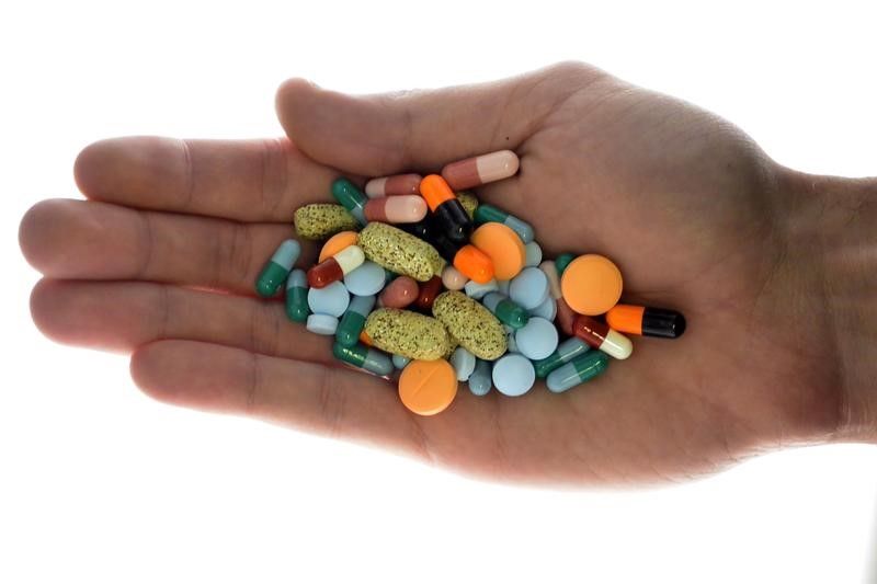 A person holds pharmaceutical tablets and capsules in this picture illustration taken in Ljubljana September 18, 2013. u00e2u20acu2022 Reuters pic