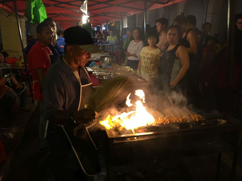 A man grills satay at the Penang International Food Festival in Penang, in George Town, April 15, 2017. u00e2u20acu2022 Picture by KE Ooi