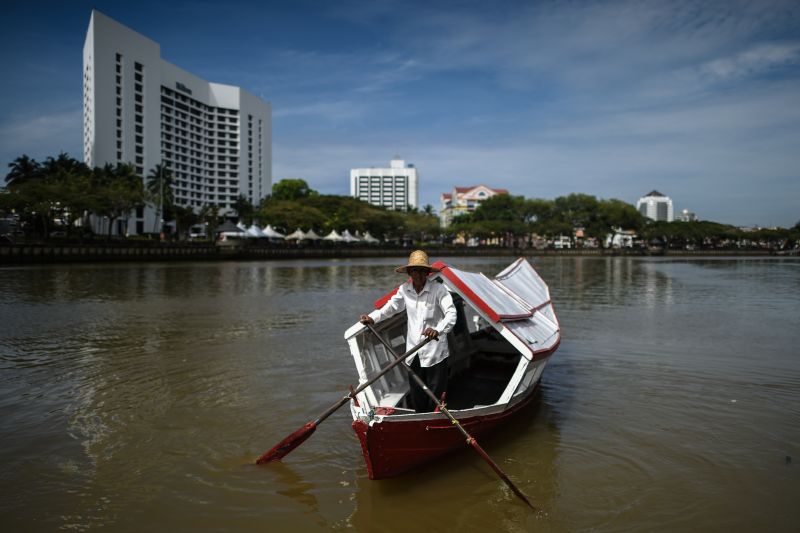 A boatman paddles his water taxi on the Sarawak river in Kuching, on April 8, 2017. u00e2u20acu2022 AFP pic