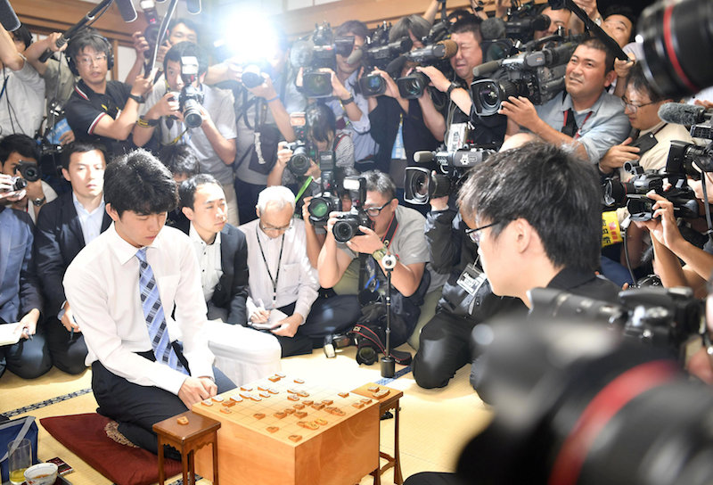 Japan’s youngest professional shogi player, 14-year-old Sota Fujii (left), is pictured after defeating fellow fourth-dan player Yasuhiro Masuda, 19, in the prestigious Ryuo Championship finals in Tokyo June 26, 2017. — Reuters pic