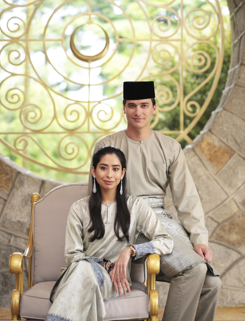 Tunku Tun Aminah Maimunah Iskandariah Sultan Ibrahim and Dennis Muhammad Abdullah pose in an official photograph that was released July 23, 2017, ahead of their wedding on August 14, 2017. u00e2u20acu201d Bernama pic