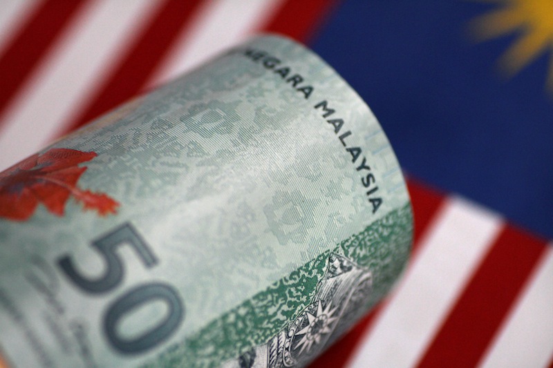 At 9.03am, the local note declined to 4.1540/1590 versus the US dollar from 4.1510/1530 at Tuesday’s close. — Reuters pic