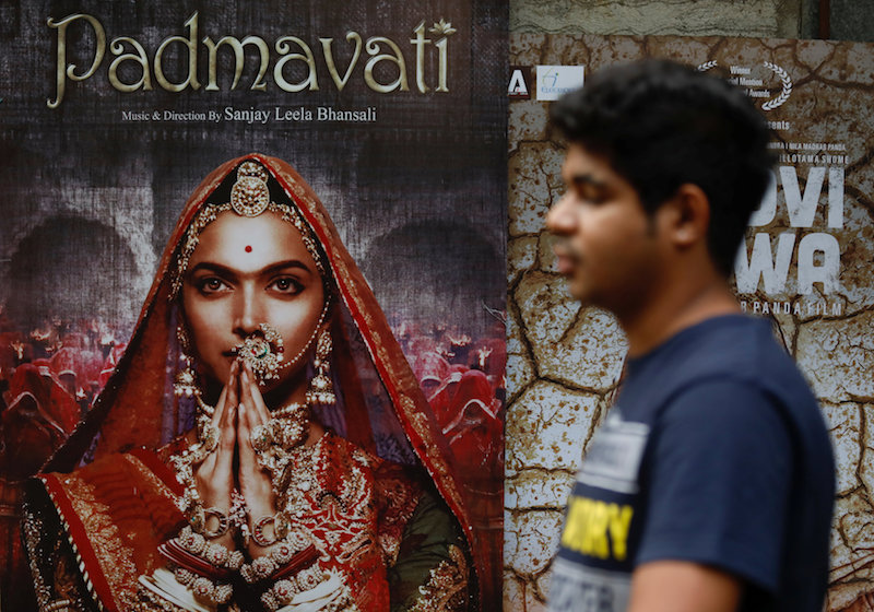 A man walks past a poster of the upcoming Bollywood movie u00e2u20acu02dcPadmavatiu00e2u20acu2122 outside a theatre in Mumbai November 21, 2017. u00e2u20acu201d Reuters pic