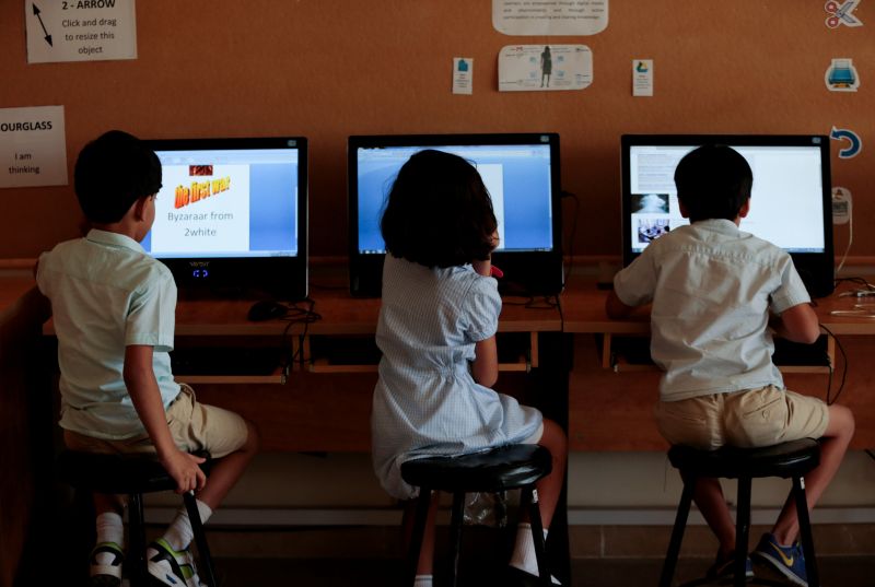 Students use computers in the technology lab at the Headstart private school in Islamabad, Pakistan November 8, 2017. u00e2u20acu2022 Reuters pic