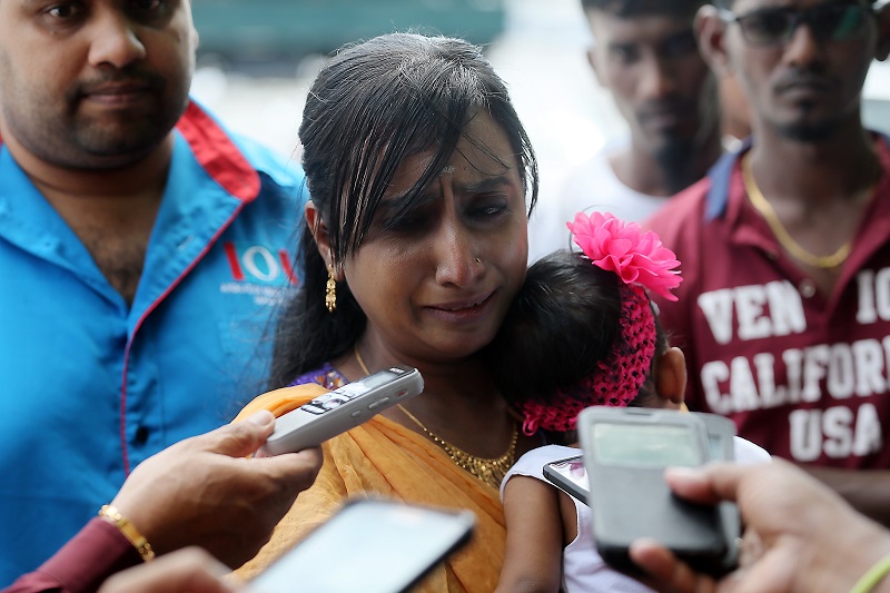 An emotional R.Vaijentimala pleaded for justice, as Marimuthuu00e2u20acu2122s shooting had placed her nine-month old daughter and herself in a desperate situation. u00e2u20acu201d Picture by Farhan Najib