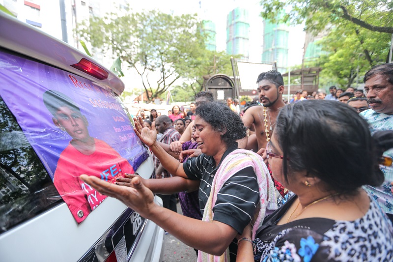 S. Kasthuri Bai mourns the death of her 15-year-old son Satiaswaran who was killed after he was hit by a falling chair at PPR Sri Pantai in Pantai Dalam January 17, 2018. u00e2u20acu201d Picture by Ahmad Zamzahuri