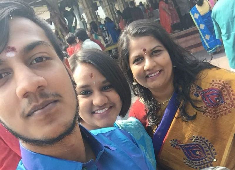 (From left) The two elder children Karan Dinish, Tevi Darsiny and their mother M. Indira Gandhi are seen here in a photo taken during Deepavali 2017. ― Picture courtesy of M. Indira Gandhi