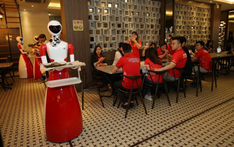 Nam Heong Kopitiam has imported 10 robots to work at its outlets in Malaysia. — Picture by Marcus Pheong