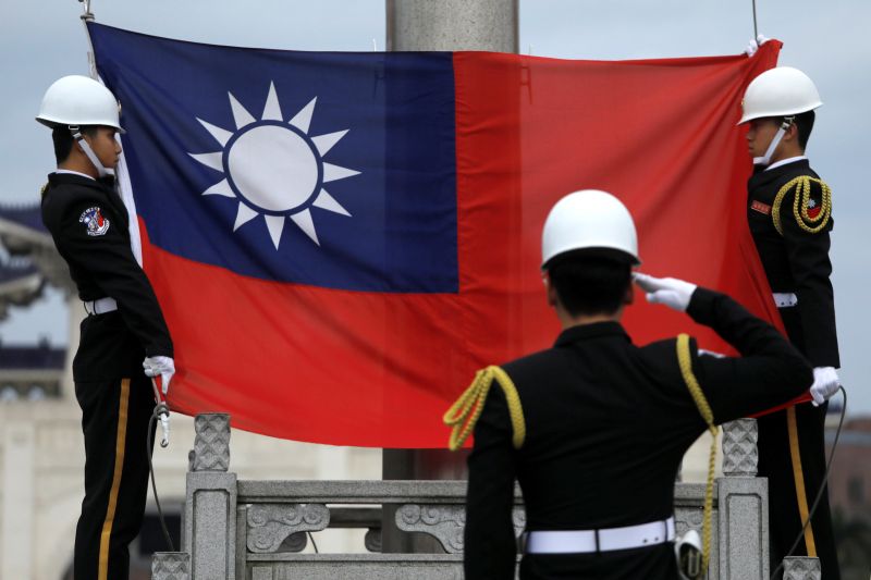 Military honour guards attend a flag-raising ceremony at Chiang Kai-shek Memorial Hall, in Taipei, Taiwan March 16, 2018. u00e2u20acu201d Reuters pic