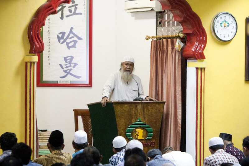 A Chinese-Muslim preacher delivers a sermon during Friday prayer at Lautze Mosque in Pasar Baru. — Jakarta Globe