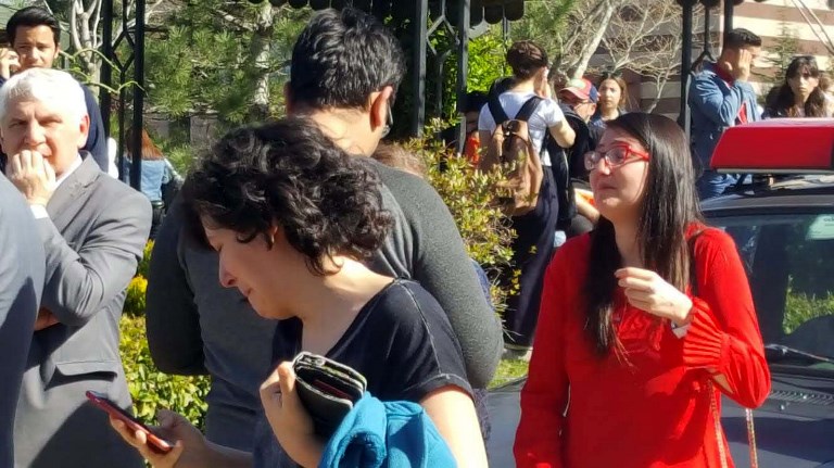 Women cry as people gather outside the Osmangazi University, on April 5, 2018, after a university employee killed four fellow staff members in a shooting. — AFP pic Women cry as people gather outside the Osmangazi University, on April 5, 2018, after a university employee killed four fellow staff members in a shooting. — AFP pic