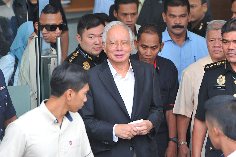 Datuk Seri Najib Razak leaves MACC headquarters in Putrajaya May 24, 2018. u00e2u20acu201d Picture by Shafwan Zaidon