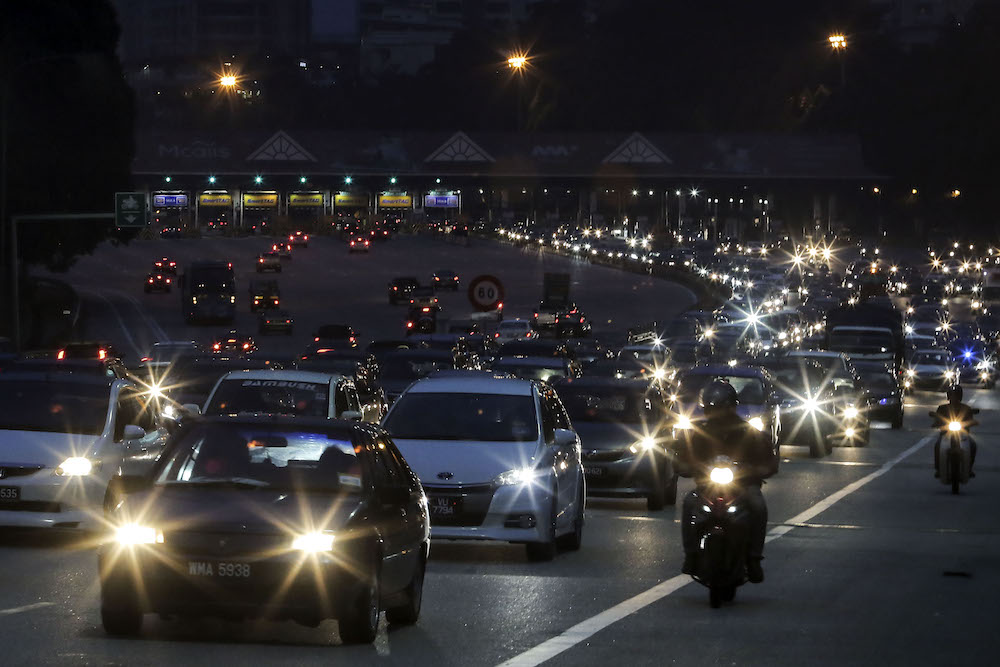 Slow-moving traffic is seen along the Plus Highway heading north near Duta toll ahead of Polling Day, in Kuala Lumpur May 8, 2018. u00e2u20acu201d Picture by Yusof Mat Isa
