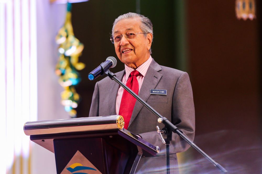 Tun Dr Mahathir Mohamad gives a speech at the Prime Ministeru00e2u20acu2122s Department Hari Raya celebration in Putrajaya July 4,2018. u00e2u20acu2022 Picture by Ahmad Zamzahuri