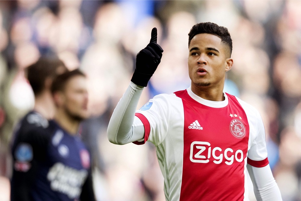 Ajax Amsterdamu00e2u20acu2122s midfielder Justin Kluivert reacts after opening the scoring during the Dutch Eredivisie match against FC Twente Enschede in Amsterdam February 11, 2018. u00e2u20acu201d Reuters pic