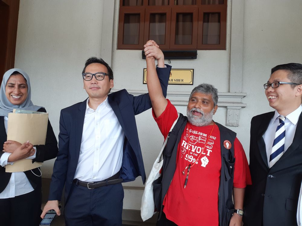 (From left) Latheefa Koya, Eric Paulsen, PSM's S. Arutchelvan, New Sin Yew after Eric and Arutchelvan's acquittal and discharge from sedition charges. u00e2u20acu201d Picture by Ida Lim