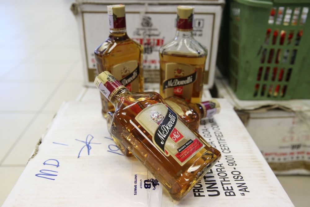 Alcoholic drinks believed to have caused the deaths of 19 people are displayed during a press conference at the Shah Alam police headquarters September 19, 2018.u00e2u20acu201d Picture by Yusof Mat Isa