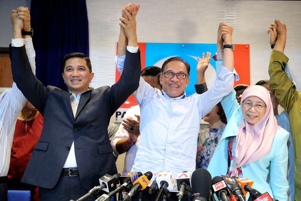 (From left) Datuk Seri Azmin Ali, Datuk Seri Anwar Ibrahim and Datuk Seri Dr Wan Azizah Wan Ismail after the press conference at PKR headquarters in Petaling Jaya September 21, 2018. u00e2u20acu201d Picture by Yusof Mat Isa