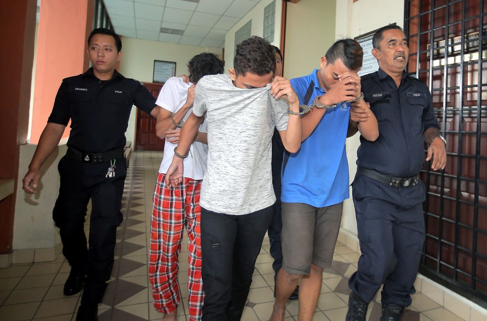 Three men were charged with raping a 15-year-old girl at a motel in Taiping on August 17. u00e2u20acu2022 Picture by Farhan Najib