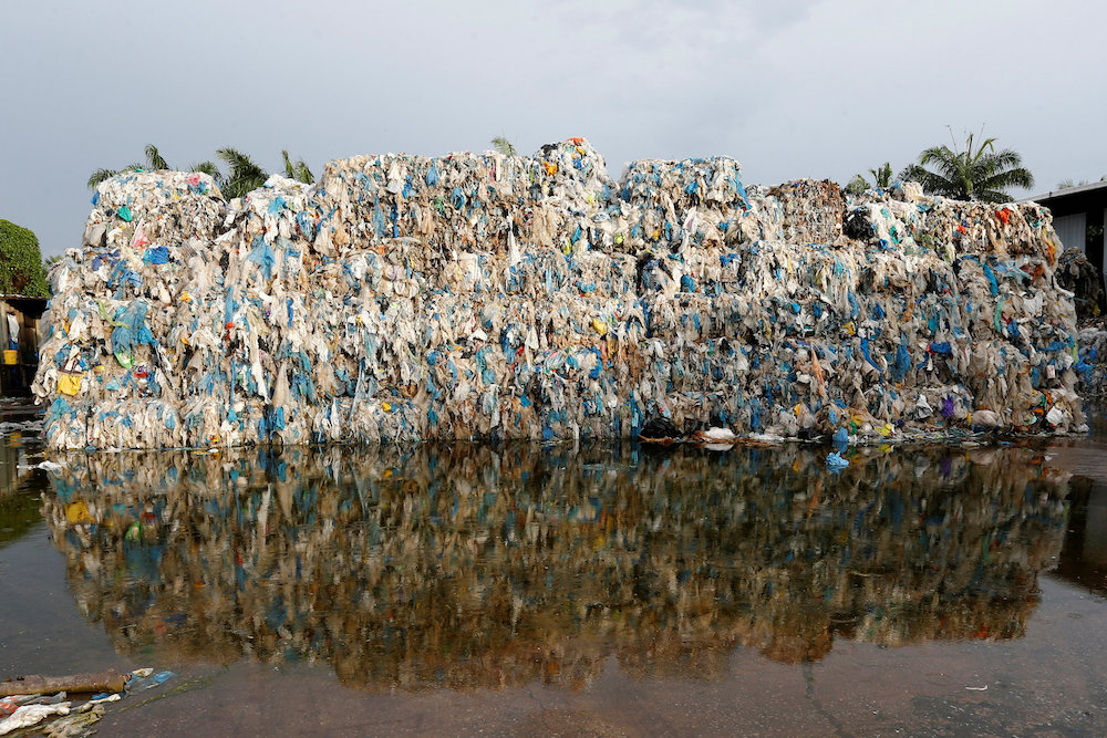 Plastic waste is piled outside an illegal recycling factory in Jenjarom, Kuala Langat October 14, 2018. u00e2u20acu201d Reuters pic