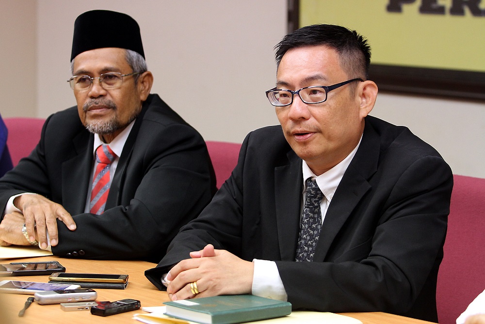 PAC chairman Leong Cheok Keng (right) said the committee had approached international accounting firms to conduct a forensic audit into the two entities, which had attracted negative headlines of late. 