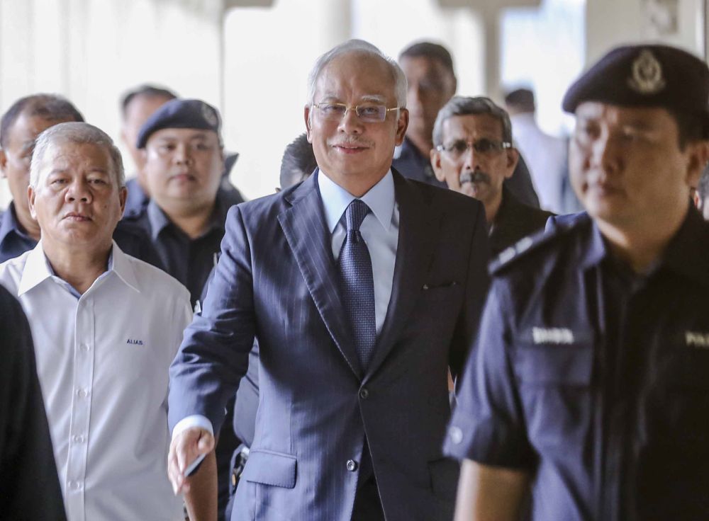 Datuk Seri Najib Razak arrives at the Kuala Lumpur High Court October 4, 2018. u00e2u20acu2022 Picture by Firdaus Latif