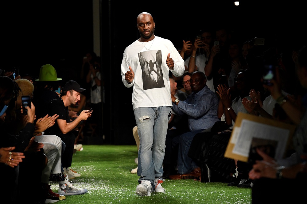US designer Virgil Abloh from Off-White fashion house greets the audience during the menu00e2u20acu2122s spring/summer 2019 collection fashion show in Paris June 20, 2018. u00e2u20acu201d AFP pic