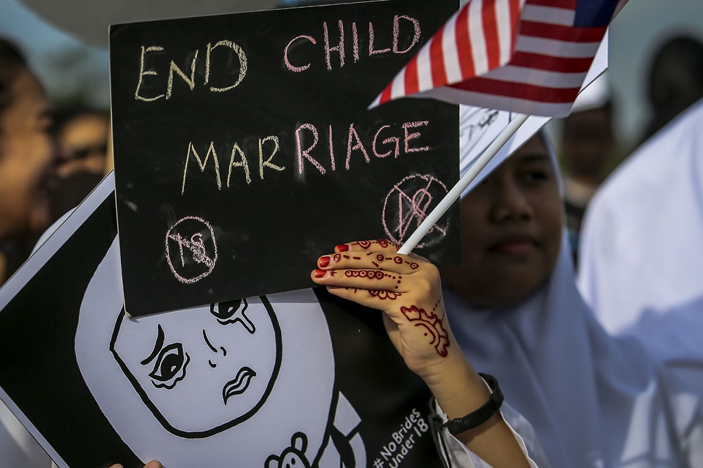 Students protest against child marriage outside the Parliament in Kuala Lumpur November 13, 2018. u00e2u20acu201d Picture by Hari Anggara