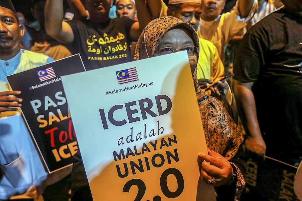 Umno and PAS members, and NGOs, attend an ICERD protest in Kampung Gajah, Perak November 17, 2018. u00e2u20acu201d Picture by Farhan Najib
