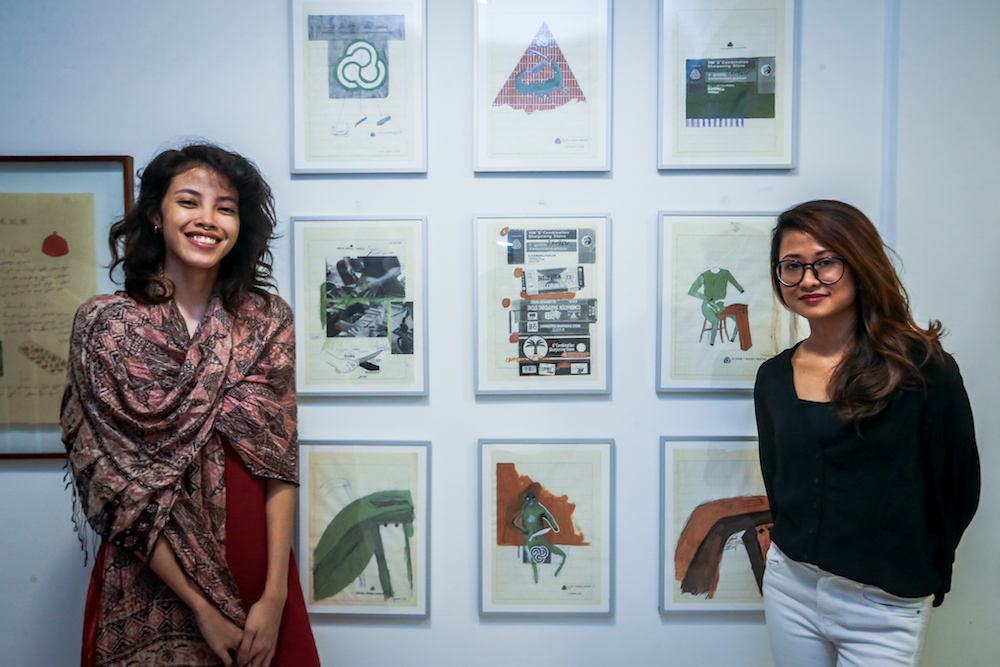 Halal Haram co-curators Nia Khalisa (left) and Hana Zamri are also showcasing their art in the exhibition. — Picture by Hari Anggara