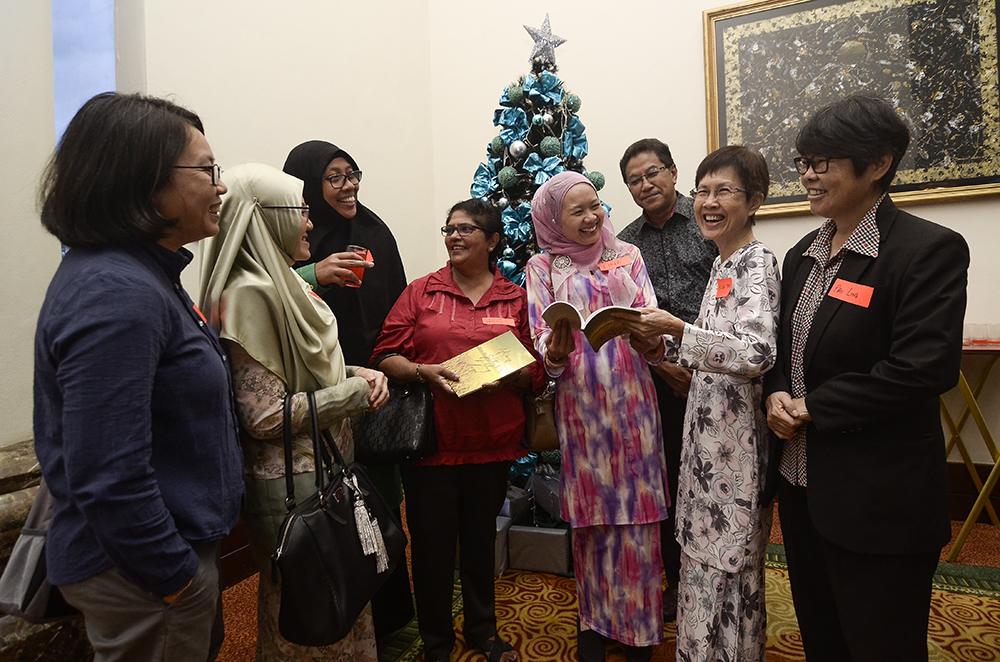 Guests make small talk before the CPHM Christmas Dinner in Subang Jaya December 13, 2018. u00e2u20acu201d Picture by Miera Zulyana