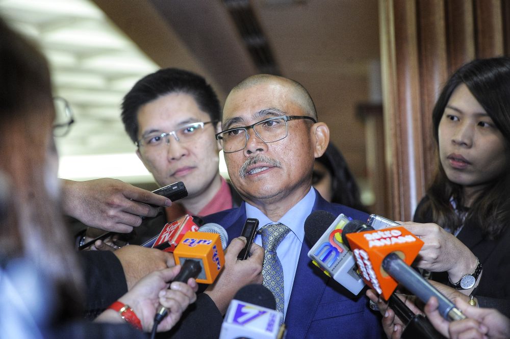 Datuk Seri Dr Ronald Kiandee speaks to reporters after PACu00e2u20acu2122s meeting at Parliament December 5, 2018. u00e2u20acu201d Picture by Shafwan Zaidon