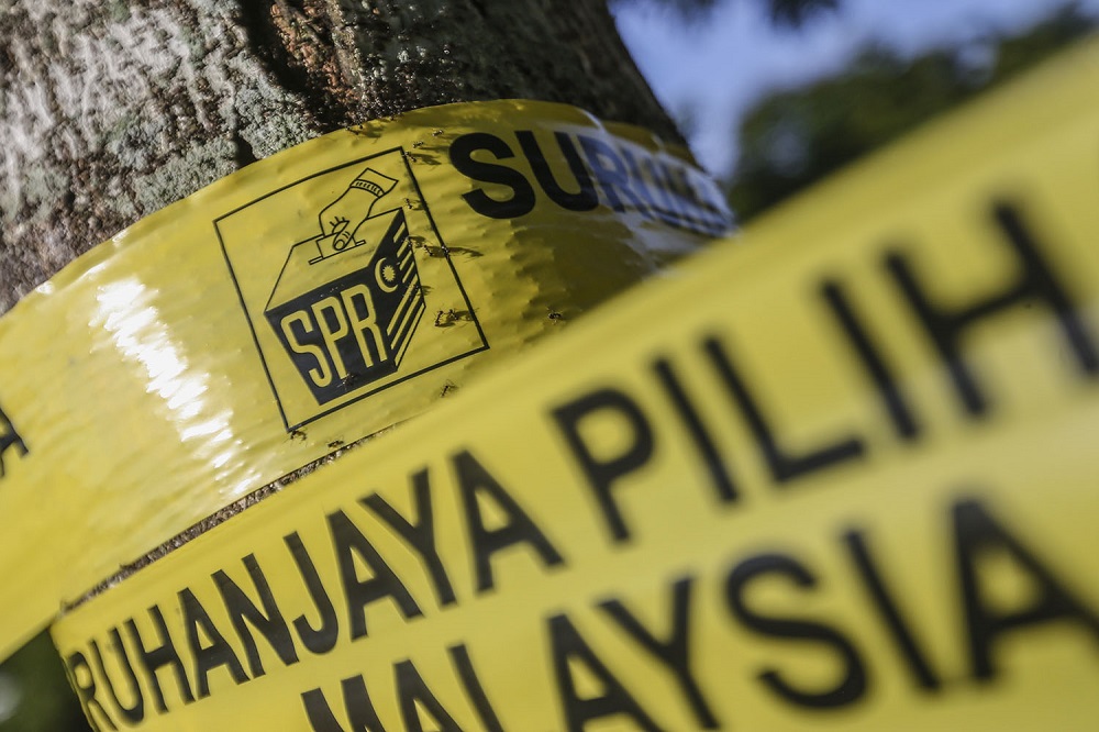 The Election Commission (EC) logo is seen on yellow tape at the Battalion 4 General Operations Force Camp in Semenyih February 26, 2019. — Picture by Hari Anggara