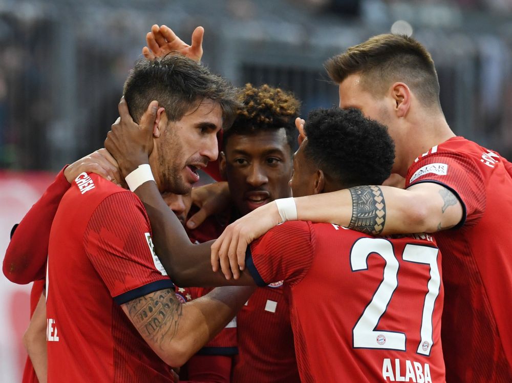Bayern Munich's Javi Martinez celebrates scoring their first goal with team mates. u00e2u20acu201d Reuters pic