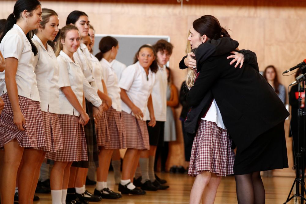 New Zealand’s Prime Minister Jacinda Ardern hugs a student during her visit to Cashmere High School in Christchurch, New Zealand March 20, 2019. — Reuters pic