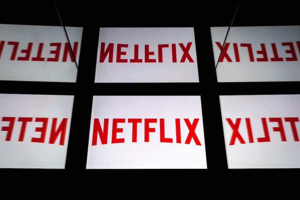 The US price of Netflix’s premium plan, which enables four streams at a time and streaming in ultra HD, was increased by US$2 to US$19.99 per month. — AFP pic