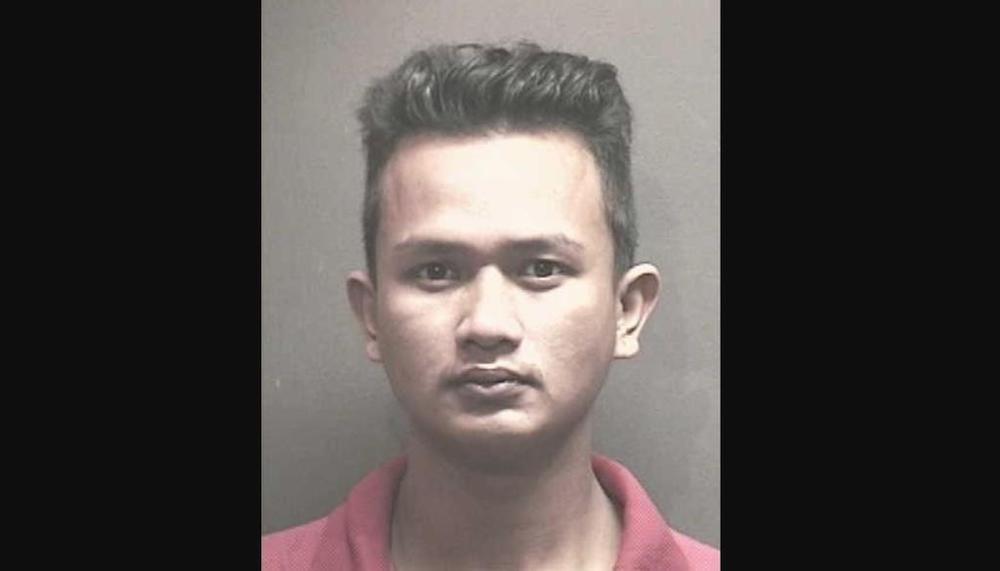 Michael Garing was part of a gang of Sarawakians that went on a robbery spree in Kallang in May 2010. He was executed on Friday (March 22) morning. u00e2u20acu201d Singapore Police Force pic