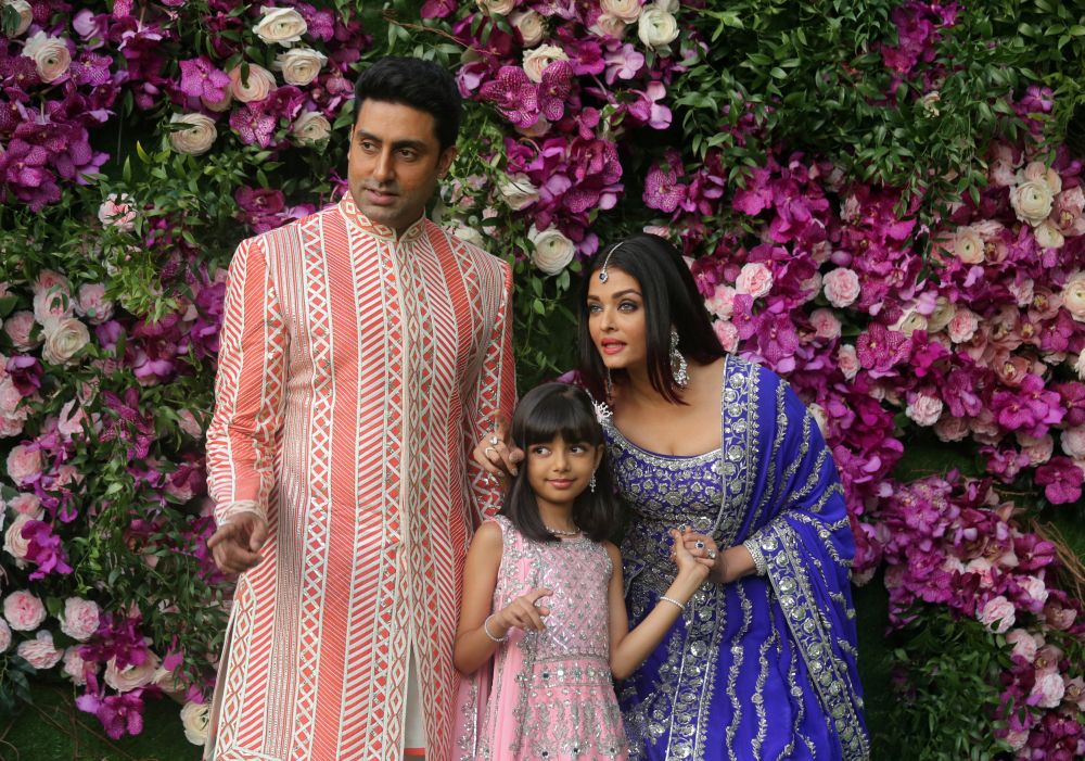 Actor Abhishek Bachchan, his wife actress Aishwarya Rai and their daughter Aaradhya pose during the wedding ceremony of Akash Ambani in Mumbai March 9, 2019. Aishwarya and her daughter tested positive for Covid-19 today. — Reuters pic