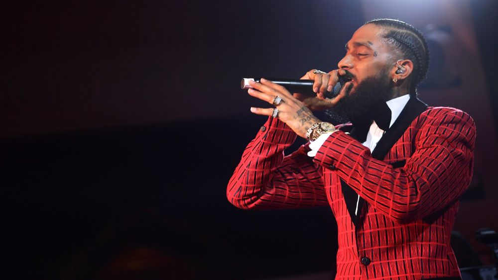 In this file photo taken February 7, 2019 Nipsey Hussle performs onstage at the Warner Music Pre-Grammy Party at the NoMad Hotel in Los Angeles. u00e2u20acu201d Matt Winkelmeyer/Getty Images North America pic via AFP