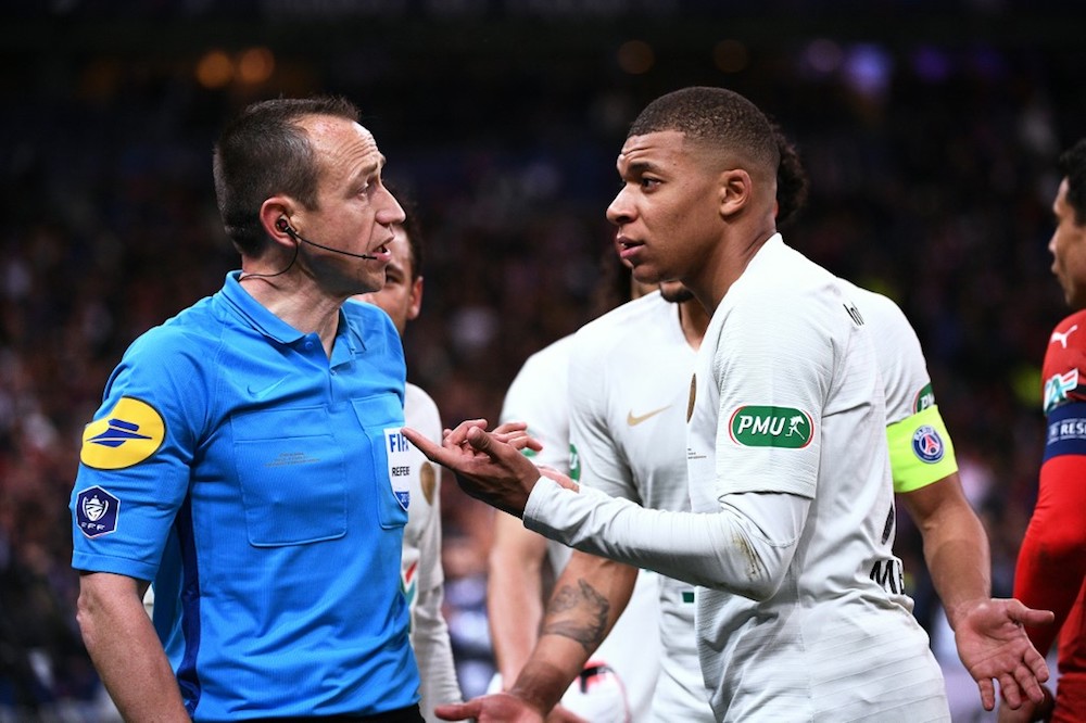 PSGu00e2u20acu2122s Kylian Mbappe reacts as he receives a red card from referee Rudy Buquet during the French Cup final match with Rennes at the Stade de France in Saint-Denis April 27, 2019. u00e2u20acu201d AFP pic