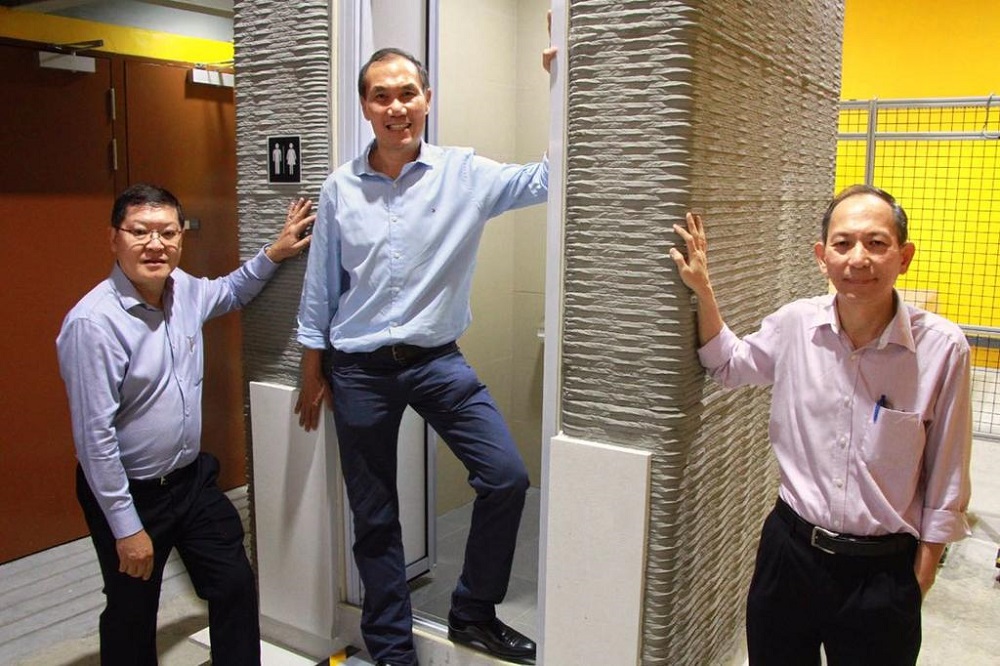 (From left) Sembcorp team lead Er Lie Liong Tjen, NTU Singapore Centre for 3D Printingu00e2u20acu2122s Dr Tan Ming Jen and Dr Wong Teck Neng with their first 3D-printed prefabricated bathroom unit. u00e2u20acu201d TODAY pic