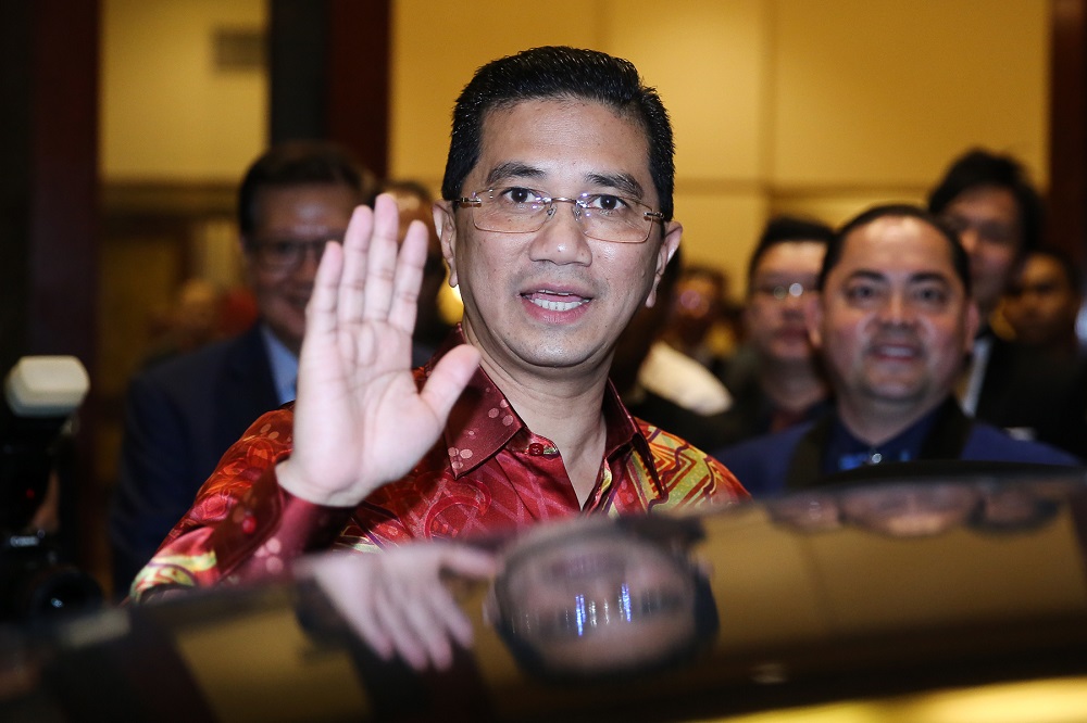 Economic Affairs Minister Datuk Seri Azmin Ali waves as he leaves the Asia Business Leadership Excellence and Lifetime Achievement Awards ceremony in Kuala Lumpur June 20, 2019. u00e2u20acu201d Picture by Yusof Mat Isa
