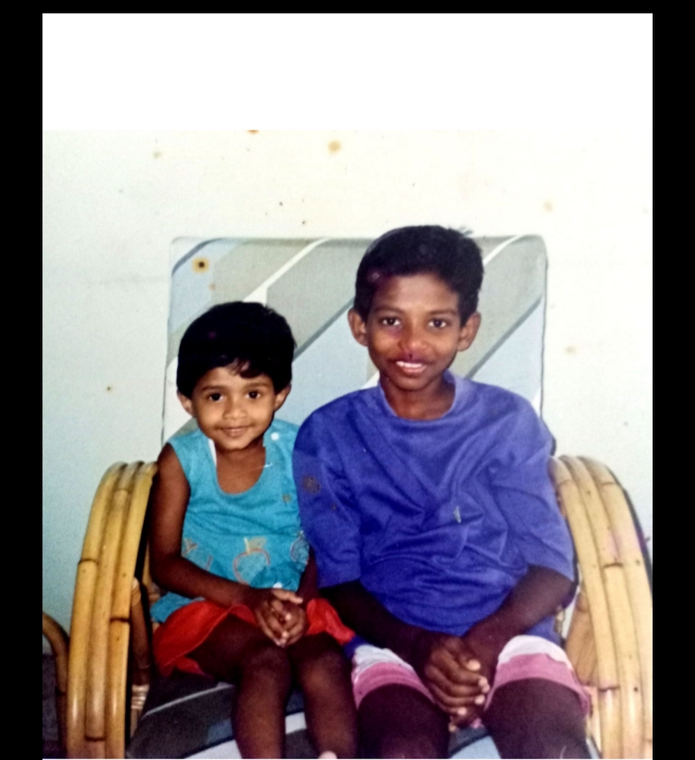 Pannir Selvam at the age of eight, with his younger sister Angelia whose expenses he helped out with during her university days and who he later shared study tips with during his jail term. — Picture courtesy of Pannir Selvam’s family