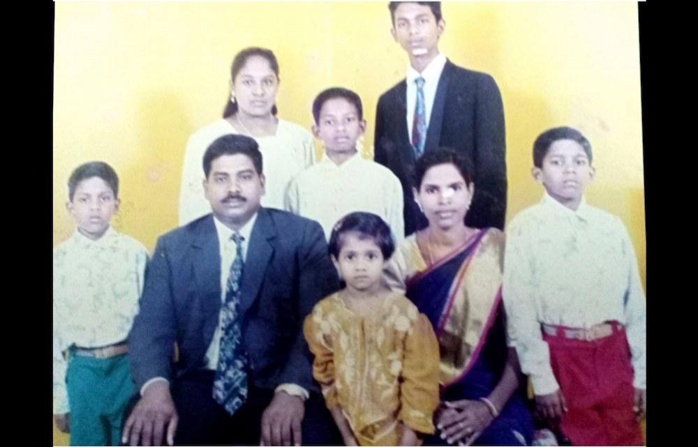 Pannir Selvam (middle in back) at the age of 11 in a family photo. The ‘last week’ was where the whole family could visit him in Singapore prison together with restrictions on visitor numbers. — Picture courtesy of Pannir Selvam’s family