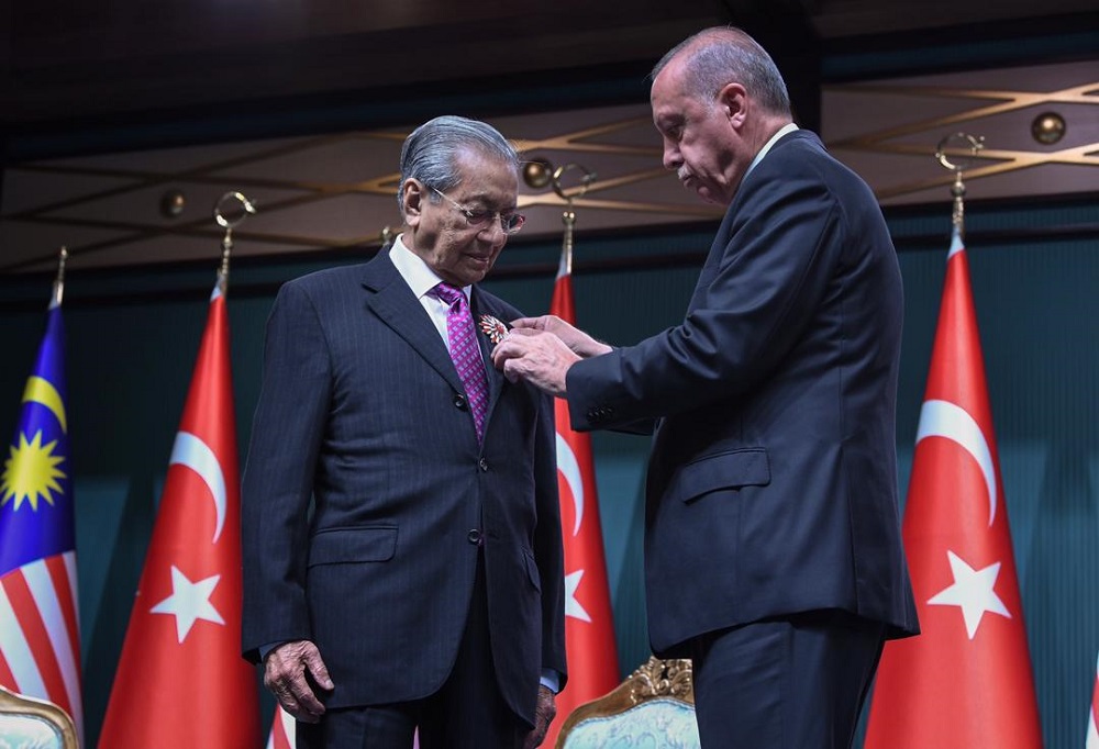 Tun Dr Mahathir Mohamad conferred the Order of the Republic by Turkish President Recep Tayyip Erdogan during a joint press conference at the Presidential Complex in Ankara July 25, 2019. u00e2u20acu201d Bernama pic