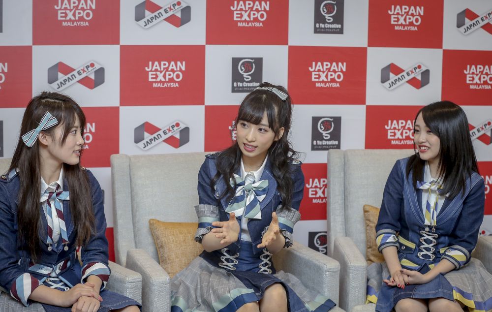 (From left) Rin Okabe, Yui Oguri, and Mion Mukaichi speak during a press conference in Kuala Lumpur. — Picture by Firdaus Latif