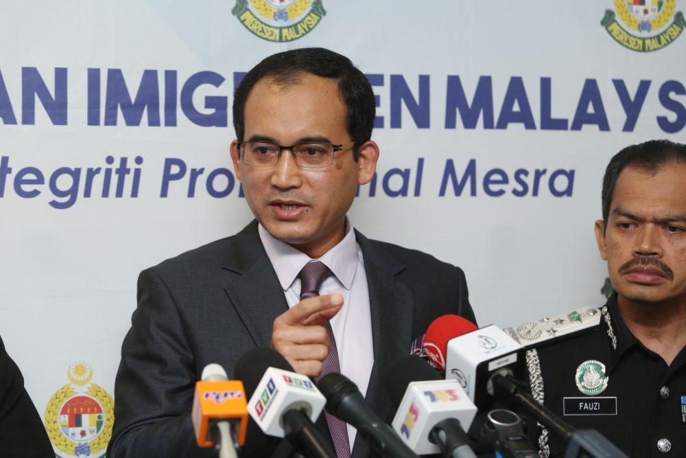 Immigration Department Director-General Datuk Khairul Dzaimee Daud speaks during a media conference in Putrajaya July 19, 2019. u00e2u20acu201d Picture by Choo Choy May