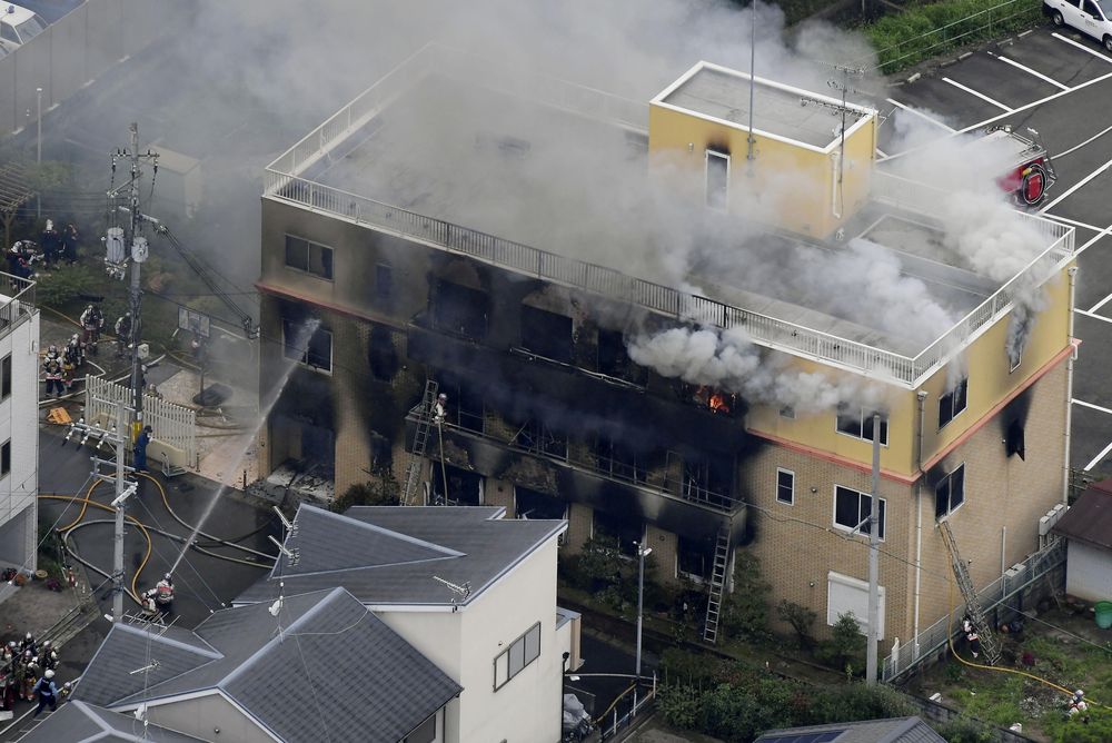 An aerial view shows firefighters battling fires at the site where a man started a fire after spraying a liquid at a three-story studio of Kyoto Animation Co in Kyoto, Japan, July 18, 2019. u00e2u20acu201d Kyodo picture via Reuters