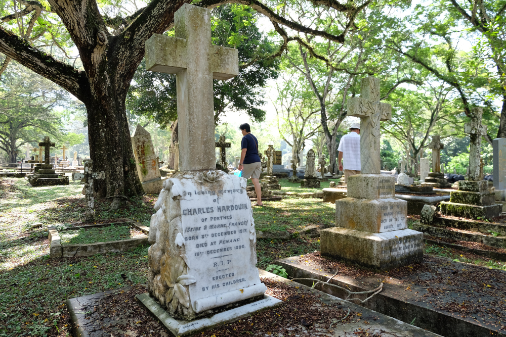 One of the earlier graves at the cemetery is of a French national who died in 1896. — Picture by Steven Ooi KE